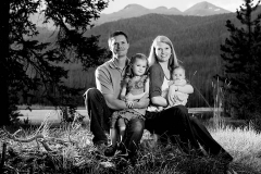 black and white family portrait in the mountains