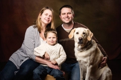 studio family photo with dog