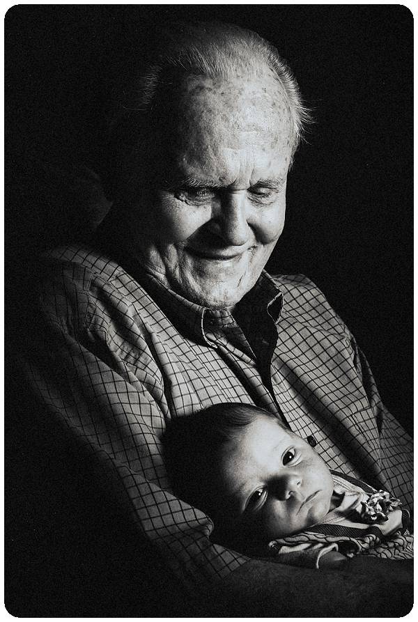 great great grandpa holding his great great grandson