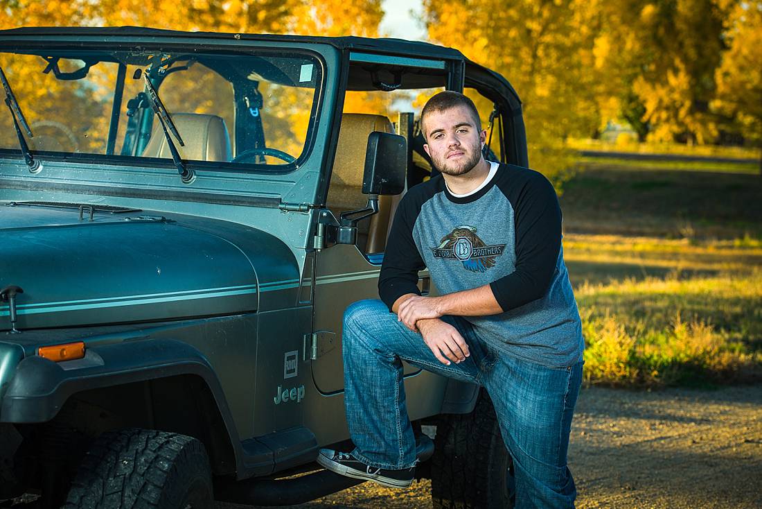 Erie high school senior with jeep on a fall afternoon